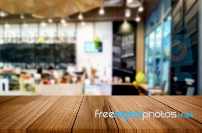 Selected Focus Empty Brown Wooden Table And Coffee Shop Or Resta… Stock Photo