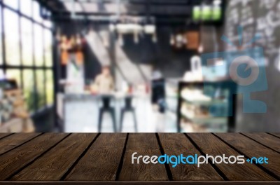 Selected Focus Empty Brown Wooden Table And Coffee Shop Or Resta… Stock Photo