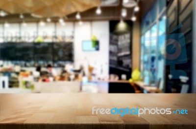 Selected Focus Empty Brown Wooden Table And Coffee Shop Or Resta… Stock Photo