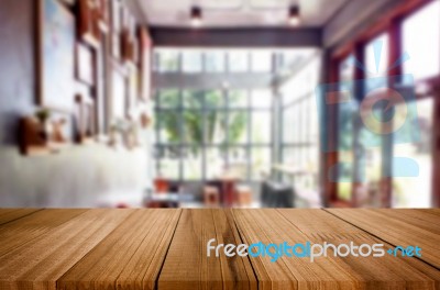 Selected Focus Empty Brown Wooden Table And Coffee Shop Or Resta… Stock Photo