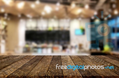 Selected Focus Empty Brown Wooden Table And Coffee Shop Or Resta… Stock Photo