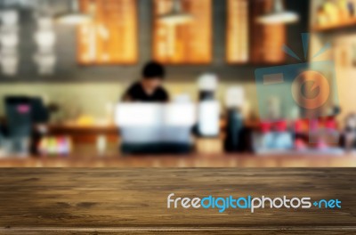 Selected Focus Empty Brown Wooden Table And Coffee Shop Or Resta… Stock Photo