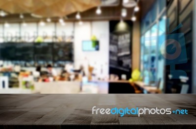 Selected Focus Empty Brown Wooden Table And Coffee Shop Or Resta… Stock Photo