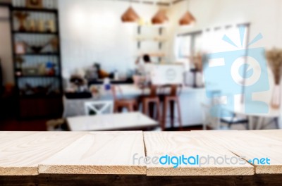 Selected Focus Empty Brown Wooden Table And Coffee Shop Or Resta… Stock Photo