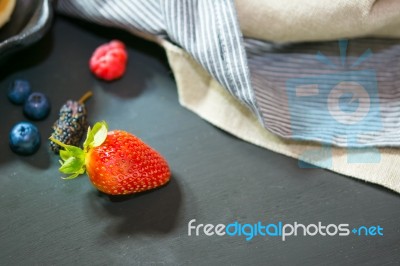 Selective Focus Strawberry On Wood Background Stock Photo