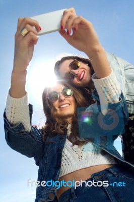 Selfie Girls Taking Photos With A Smartphone Stock Photo