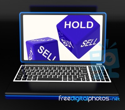 Sell And Hold Dices On Laptop Showing Strategies Stock Image