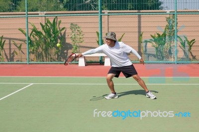 Senior 59s Years Old Man Playing Tennis In Sport Club Stock Photo