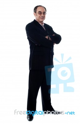 Senior Businessman Arm Crossed Stock Photo