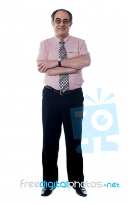 Senior Businessman Arm Crossed Stock Photo