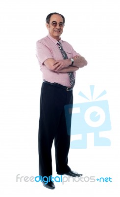 Senior Businessman Arm Crossed Stock Photo