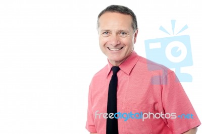 Senior Businessman Smiling To Camera Stock Photo