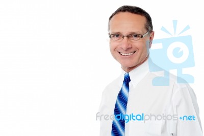 Senior Businessman Smiling To Camera Stock Photo