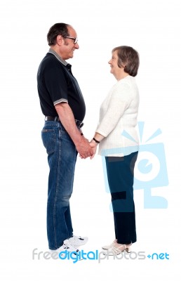 Senior Couples Looking Each Other Stock Photo