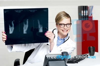 Senior Doctor Holding X Ray Stock Photo