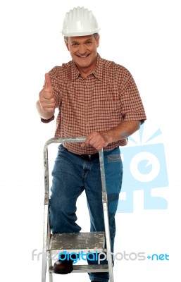 Senior Engineer showing thumbs up Stock Photo