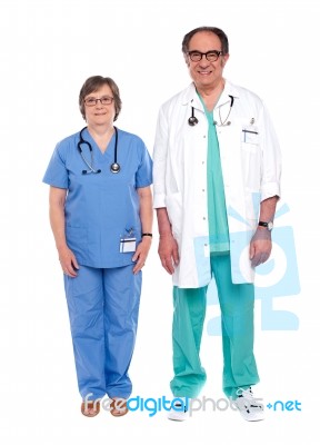 Senior Male And Female Physicians Stock Photo