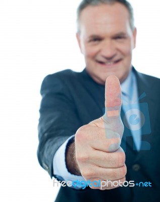 Senior male Showing Thumbs up Stock Photo