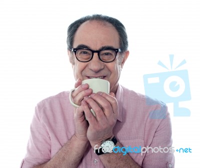 Senior Man Drinking Coffee Stock Photo