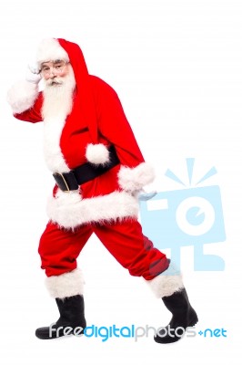 Senior Man In Santa Dress Dancing Over White Stock Photo