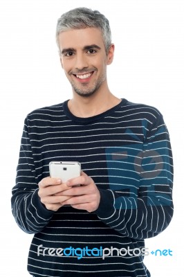 Senior Man On Smart Phone Stock Photo