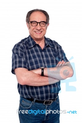 Senior man posing with arm crossed Stock Photo