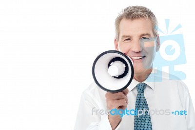 Senior Man Posing With Megaphone Stock Photo