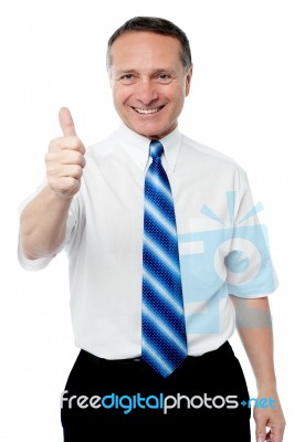 Senior Mature Man Giving Thumbs Up Stock Photo