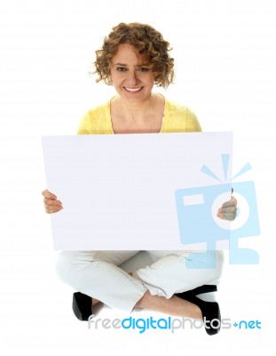 senior Woman Holding Blank Board Stock Photo