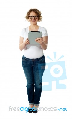 Senior Woman Holding Tablet Pc Stock Photo