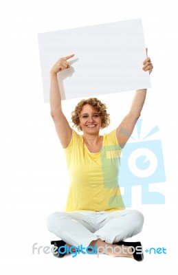 Senior Woman pointing Blank Board Stock Photo