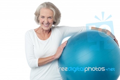 Senior Woman Posing With Exercise Ball Stock Photo