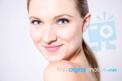 Sensual Blue Eyed Model Turning Back Stock Photo