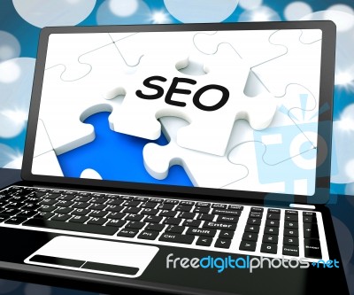 Seo On Laptop Shows Search Engine Optimization Stock Image