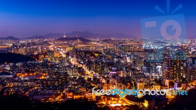 Seoul Cityscape And Seoul Tower At Night. Traffic In Seoul, South Korea Stock Photo