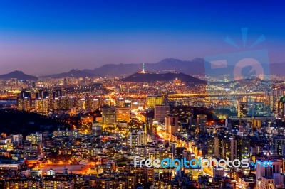 Seoul Cityscape And Seoul Tower At Night. Traffic In Seoul, South Korea Stock Photo