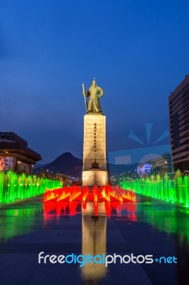 Seoul, South Korea - April 30, 2016:beautifully Color Water Fountain At Gwanghwamun Plaza With The Statue Of The Admiral Yi Sun-sin In Downtown.photo Taken On April 30,2016 In Seoul,south Korea Stock Photo