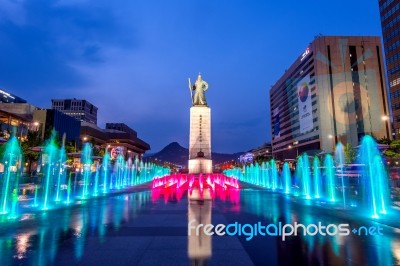 Seoul, South Korea - April 30, 2016:beautifully Color Water Fountain At Gwanghwamun Plaza With The Statue Of The Admiral Yi Sun-sin In Downtown.photo Taken On April 30,2016 In Seoul,south Korea Stock Photo