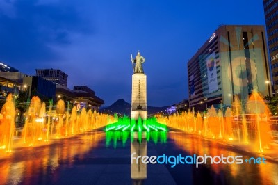 Seoul, South Korea - April 30, 2016:beautifully Color Water Fountain At Gwanghwamun Plaza With The Statue Of The Admiral Yi Sun-sin In Downtown.photo Taken On April 30,2016 In Seoul,south Korea Stock Photo