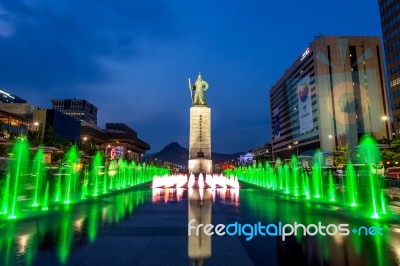 Seoul, South Korea - April 30, 2016:beautifully Color Water Fountain At Gwanghwamun Plaza With The Statue Of The Admiral Yi Sun-sin In Downtown.photo Taken On April 30,2016 In Seoul,south Korea Stock Photo