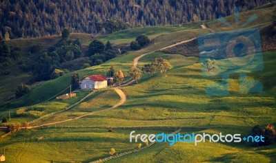 September Rural Scene In Mountains. Authentic Village And Fence Stock Photo