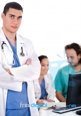 Serious Young Doctor Looking At The Camera Stock Photo