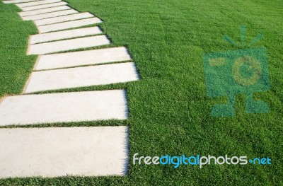 Serpentine Pathway Stones On A Park Lawn (concept) Stock Photo