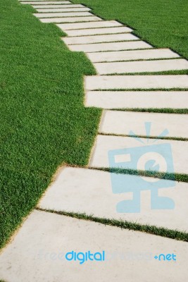 Serpentine Pathway Stones On A Park Lawn (concept) Stock Photo