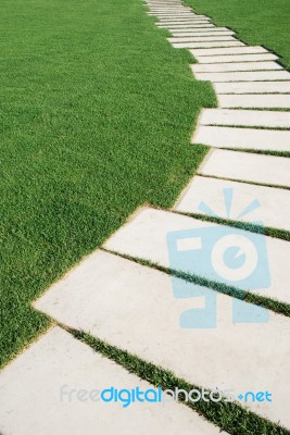 Serpentine Pathway Stones On A Park Lawn (concept) Stock Photo