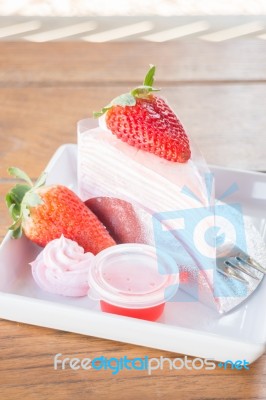 Serving Fresh Strawberry Crepe Cake Stock Photo