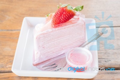 Serving Fresh Strawberry Crepe Cake Stock Photo