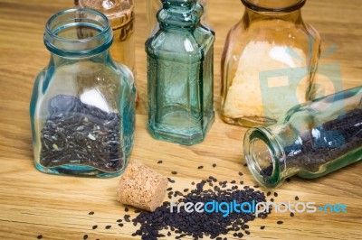 Sesami Seed And Rice In Bottles Stock Photo