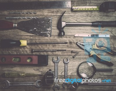 Set Of Tools Over A Wood Background Stock Photo