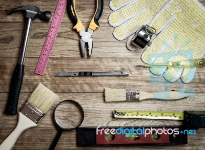 Set Of Tools Over A Wood Background Stock Photo